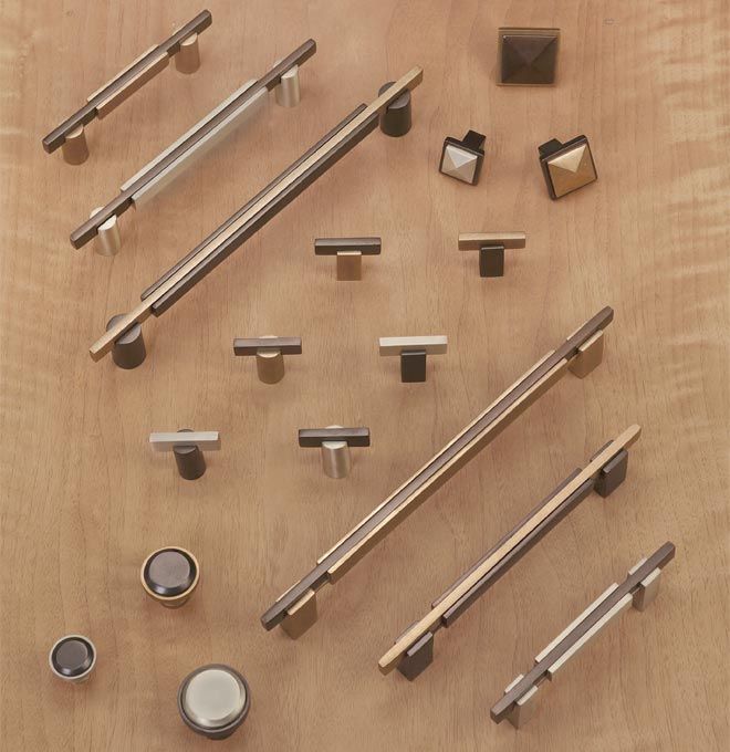 A display of various stylish knobs and handles in different finishes, showcasing options for enhancing kitchen and bathroom aesthetics